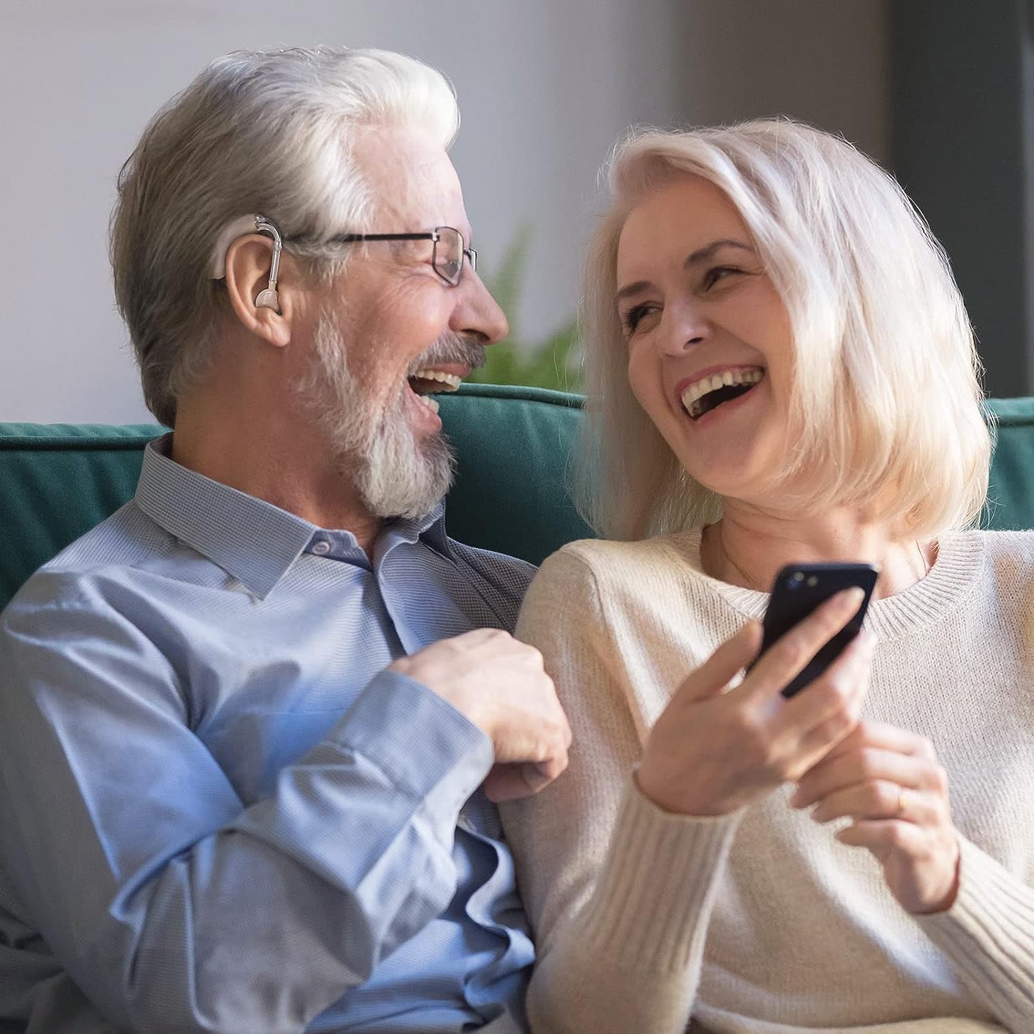 image of a rechargeable hearing aid with noise canceling technology for seniors and adults with hearing loss, in-ear design with volume control