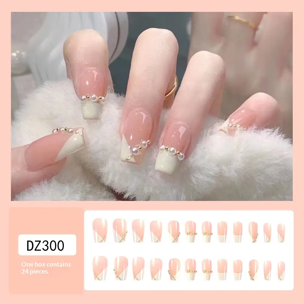 24 Pieces Of Short Coffin-shaped Pink French Artificial Nails With Elegant French Pearl Design.This Nail Set Is Suitable For Parties,dances Or Daily Wear.Long P