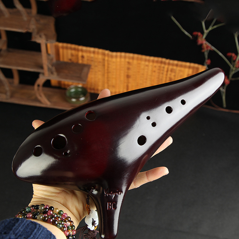 Title 1, 12 hole bass C key performance smoked ocarina