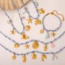 Blue Rope Braided Ocean-themed Pendant Set, Featuring Starfish, Dolphins, And Sea Turtles, Multi-dangling Necklace And Bracelet. view 1