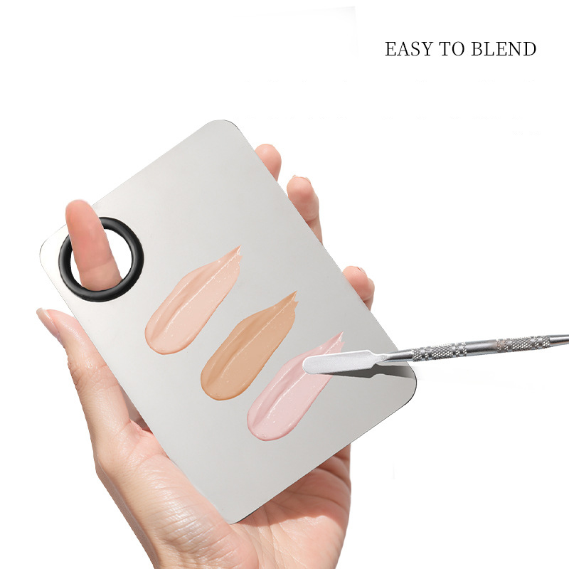 Stainless Steel Makeup Palette with Spatula, product details: Extremely rich simple sense, convenient toning, suitable for professionals and non-professionals. Stainless steel color handle: strong and smooth, distinctive modelling. Suitable for all kinds 