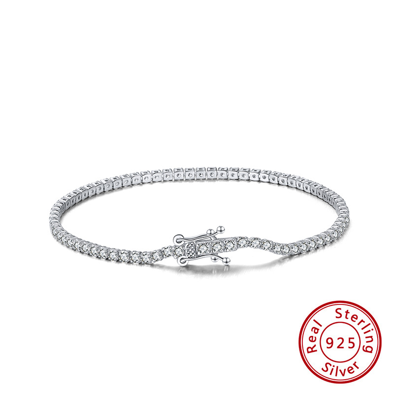 Title 1, Single row zircon sterling silver bracelet. A b...