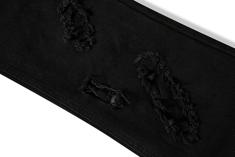 Damaged Straight Leg Jeans With A Knife Cut Hole