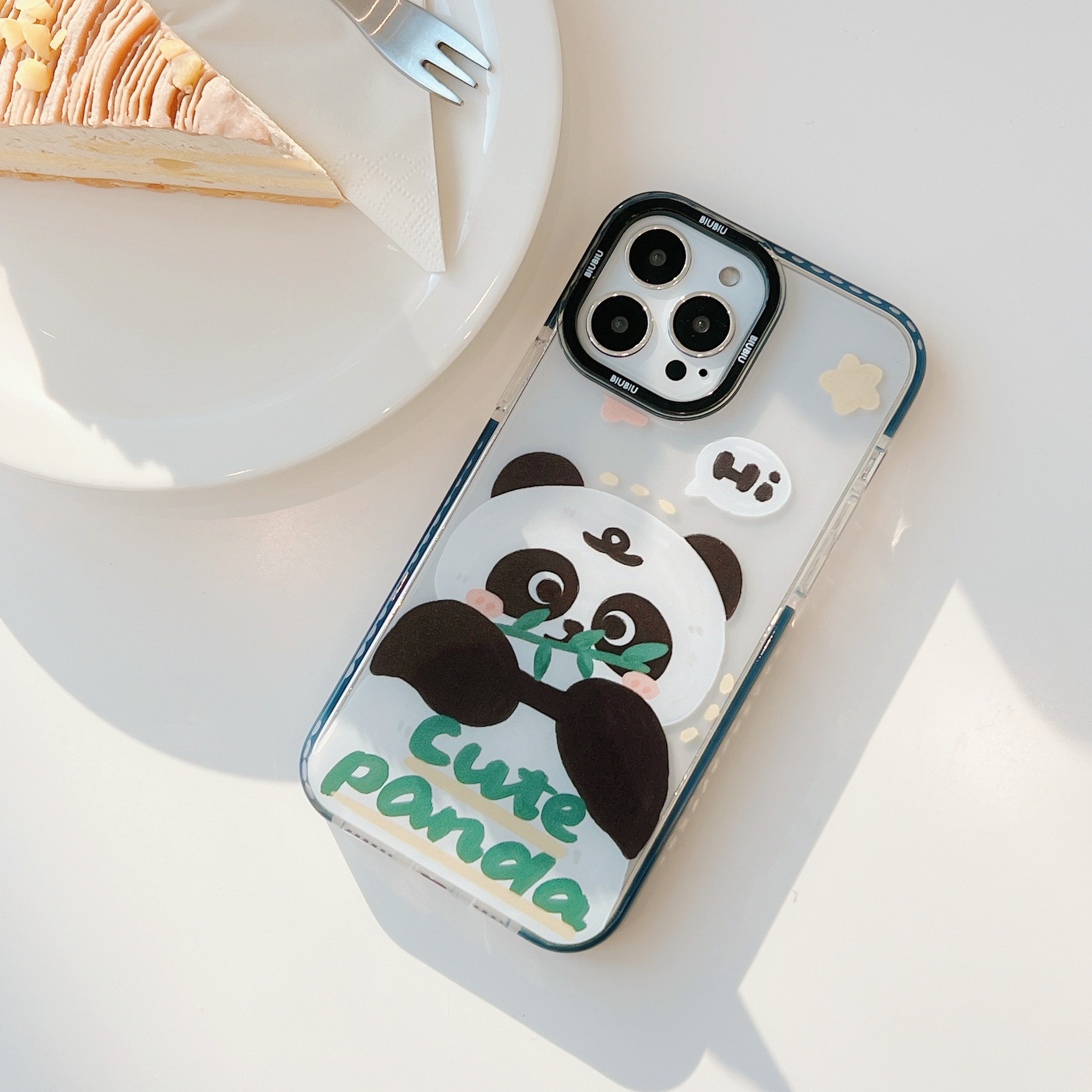 Panda eating bamboo leaves