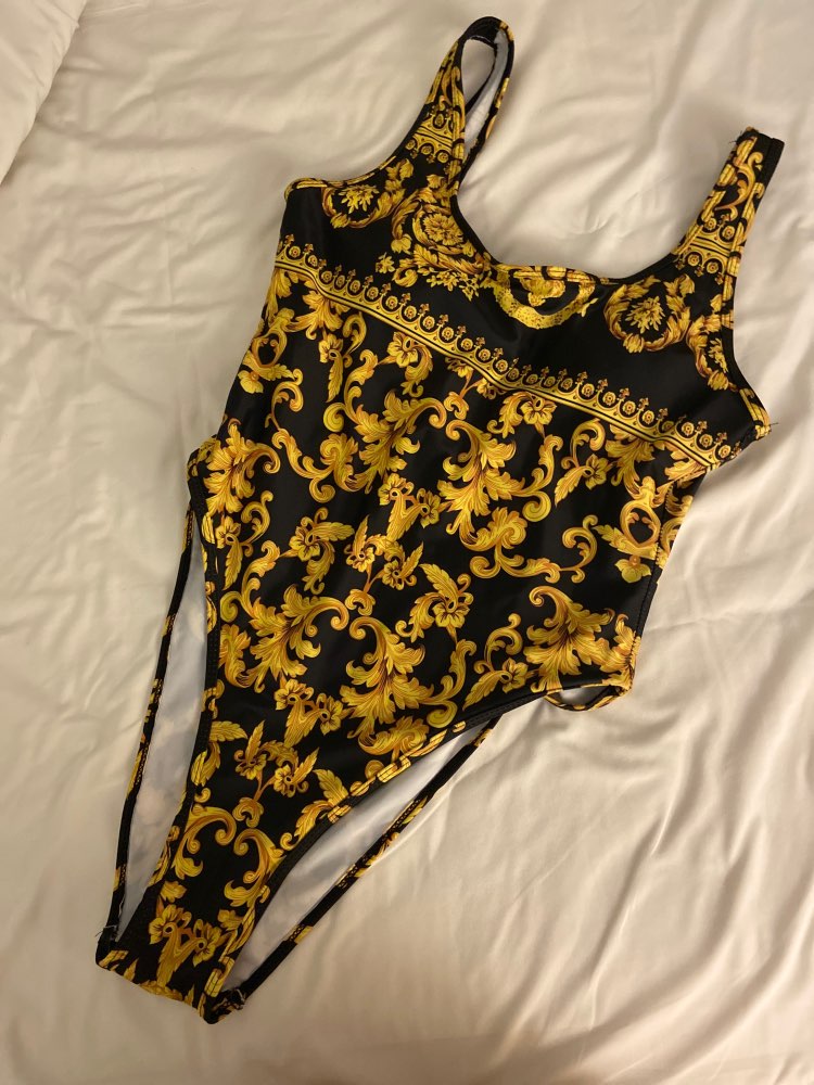 Title 3, One-piece halterback swimsuit