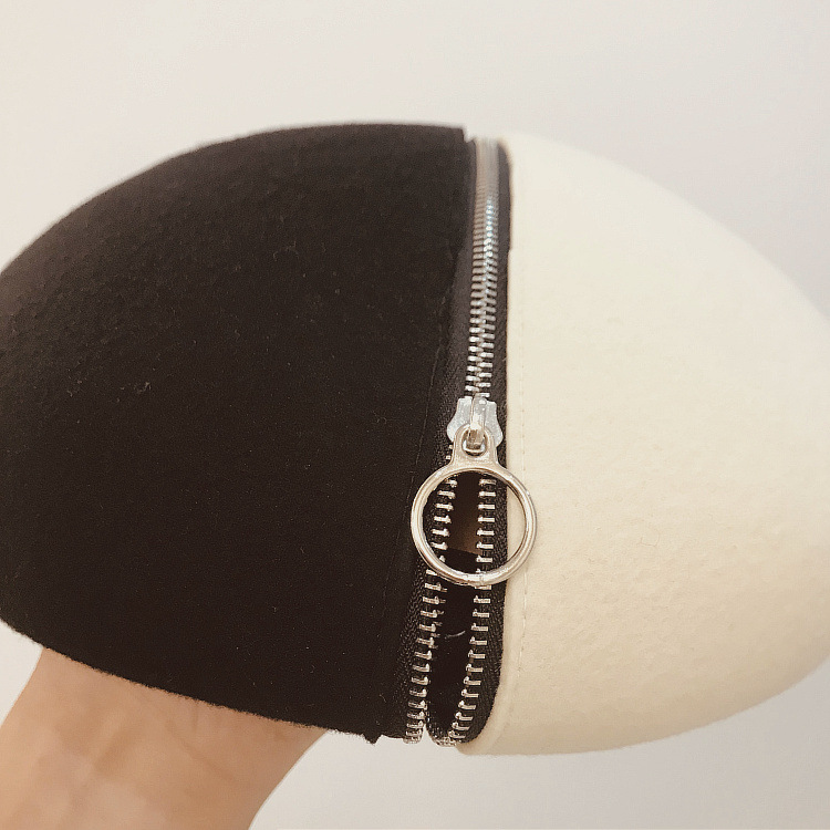 Title 7, Black and white wool felt hat with zipper and b...