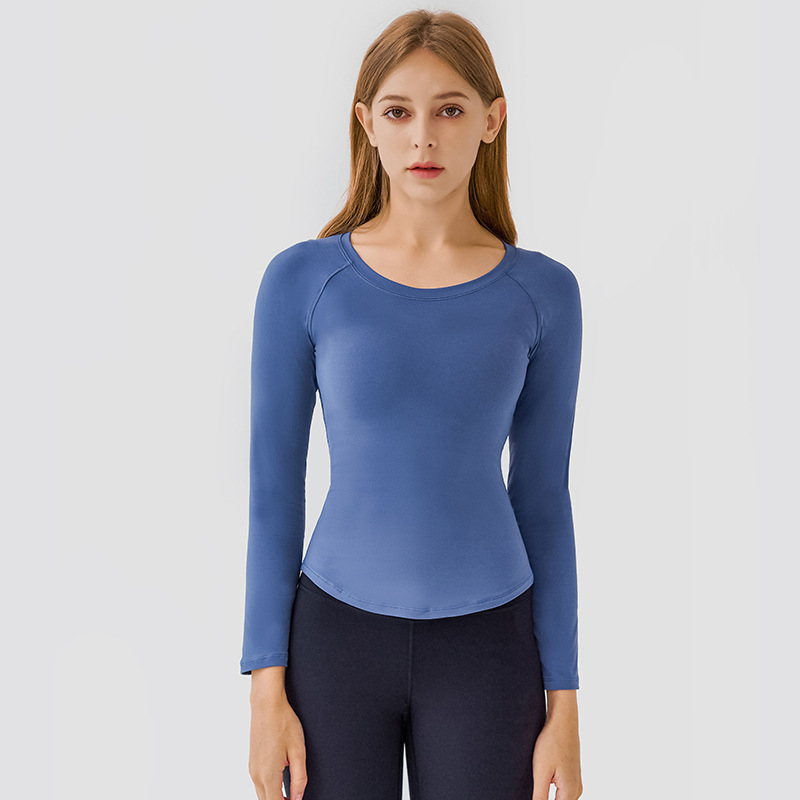 Title 10, Womens slim fit thin yoga top with a nude feel...