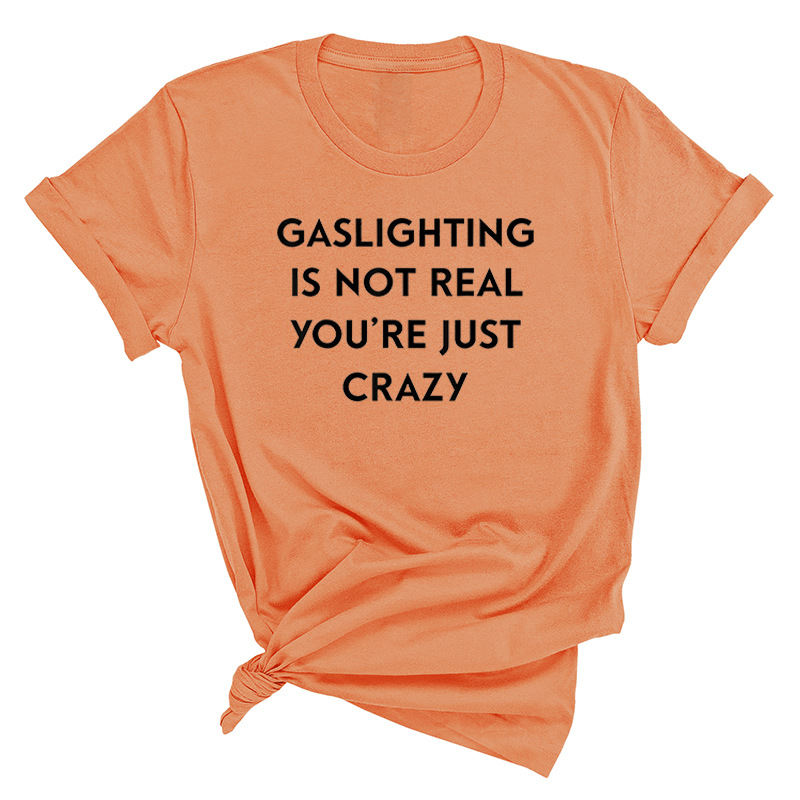 Title 22, Herrenmode mit Aufdruck „Gaslighting Is Not Rea...