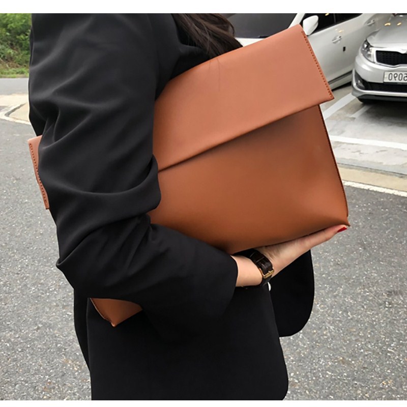 Title 3, Stylish large-capacity clutch bag for all your ...