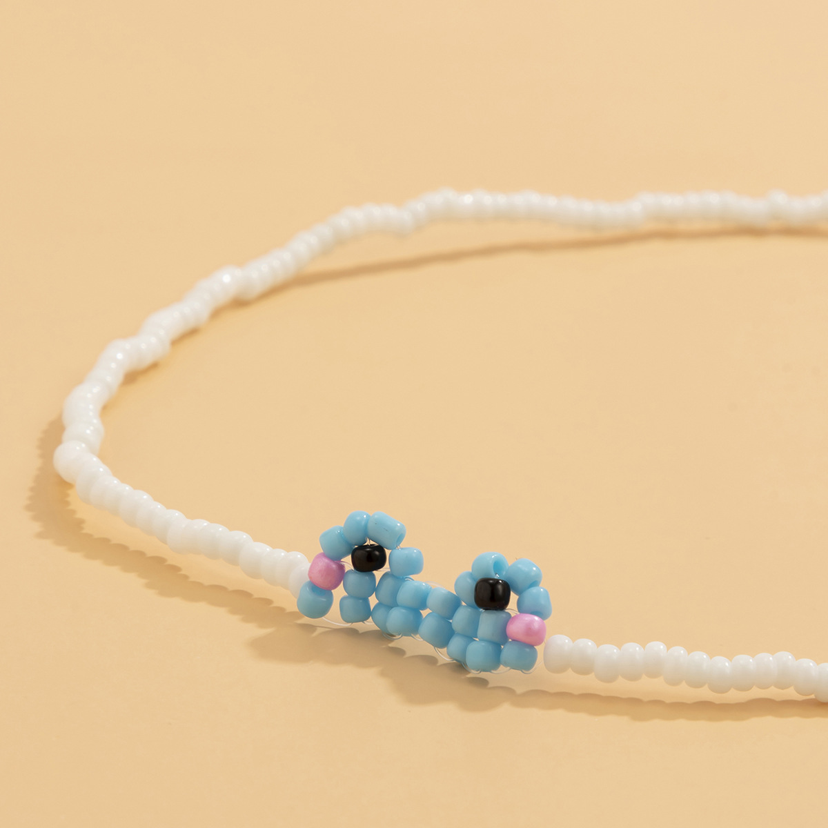 سلسلة صغيرة بحبل يدوي بنقشة ضفدع لطيفة وعصرية