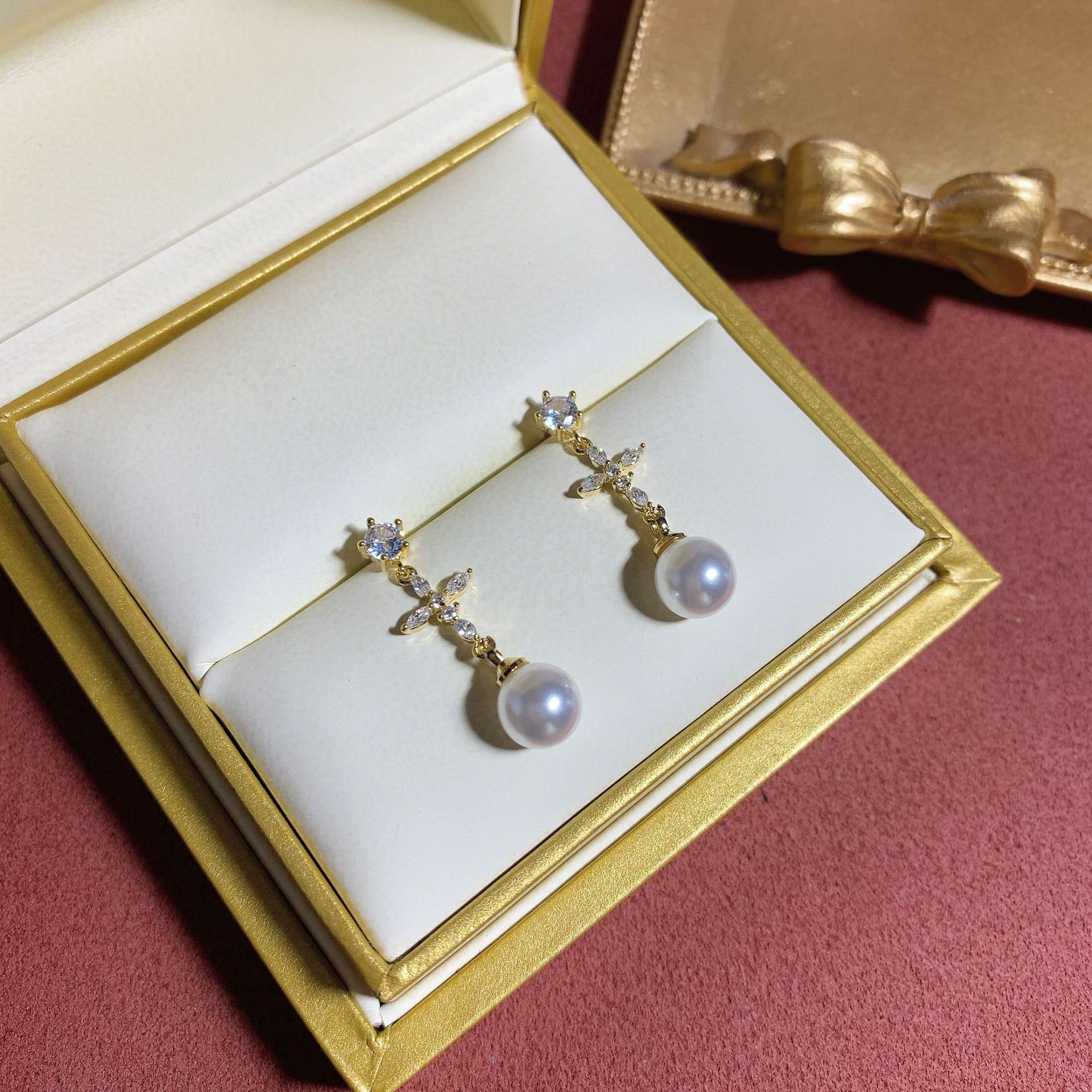 Elevate your elegance with the timeless beauty of La Perle™ Pearl Earrings. Crafted with meticulous attention to detail, each pair showcases lustrous, perfectly round pearls that embody sophistication and grace. Set in premium 14K gold, these earrings offer a classic yet modern design, making them a versatile addition to any jewelry collection.