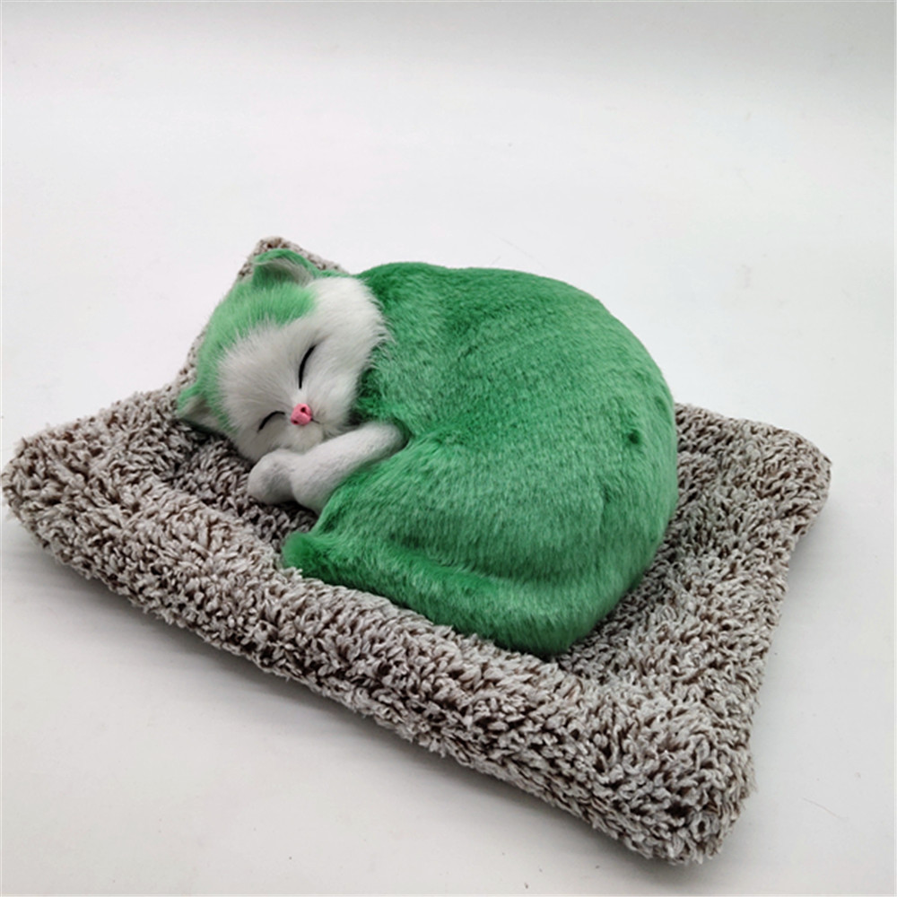 Green sleeping cat