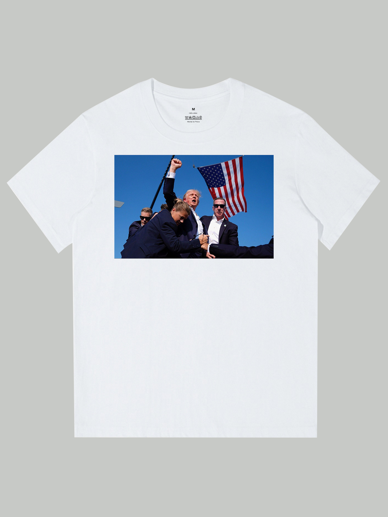 Trump 2024 Streetwear Cotton TShirt. 100% Combed Ring-Spun Cotton Heavy-duty 6 Oz. fabric for maximum durability Pre-shrunk to ensure a perfect fit Taped neck & shoulders for added comfort Seamless non-topstitched 7/8