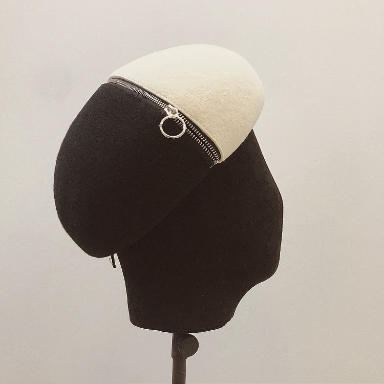 Title 5, Black and white wool felt hat with zipper and b...