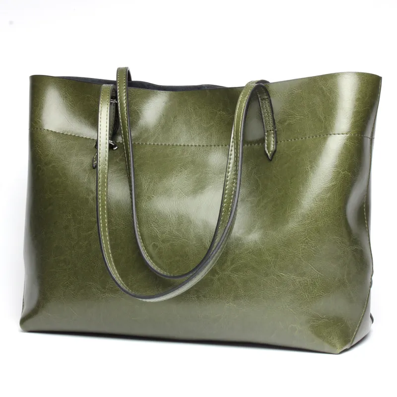 New fashion leather handbag shoulder cowhide shopping bag leather bag is simple and practical, portable