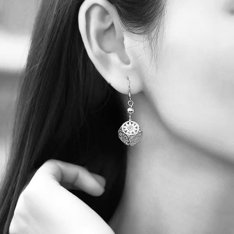 Boucles pendantes argent pur 999, style épuré & audacieux 2026