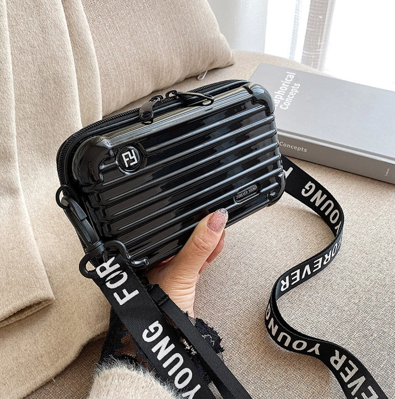 Trousse de toilette rigide transparente · noire, 7 pouces