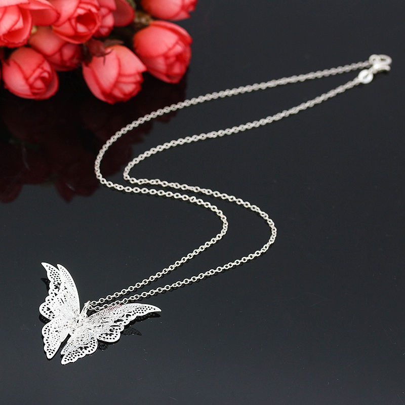 EBay explosion of silver hollow necklace with a diamond tip butterfly flying wings butterfly chain