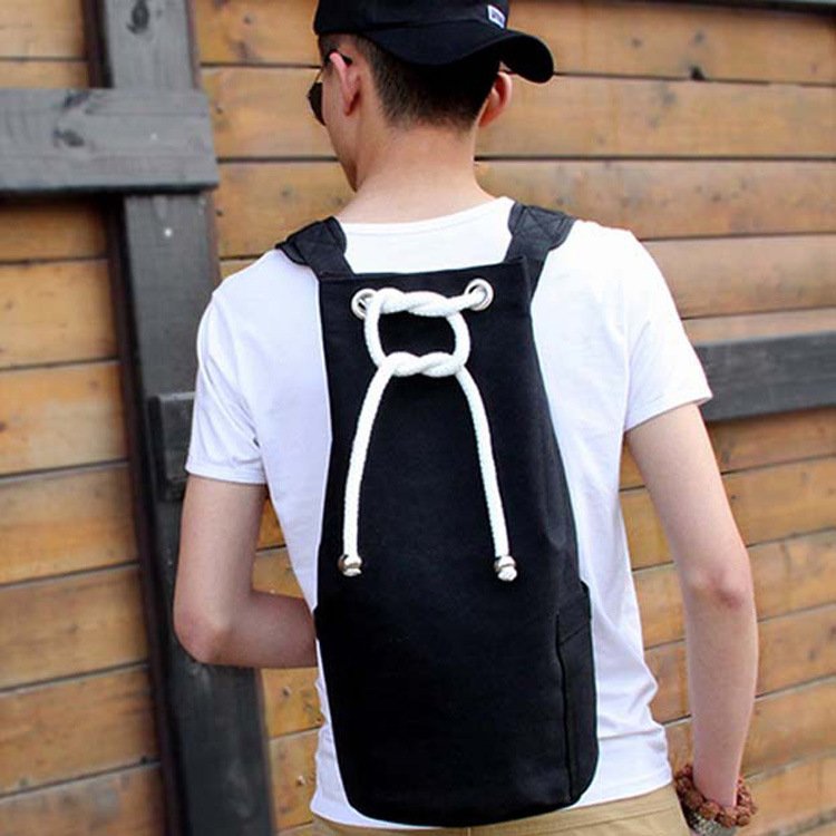 The factory provides Korean men's shoulder and shoulder canvas bucket, sports bag, student bag, travel leisure basketball bag