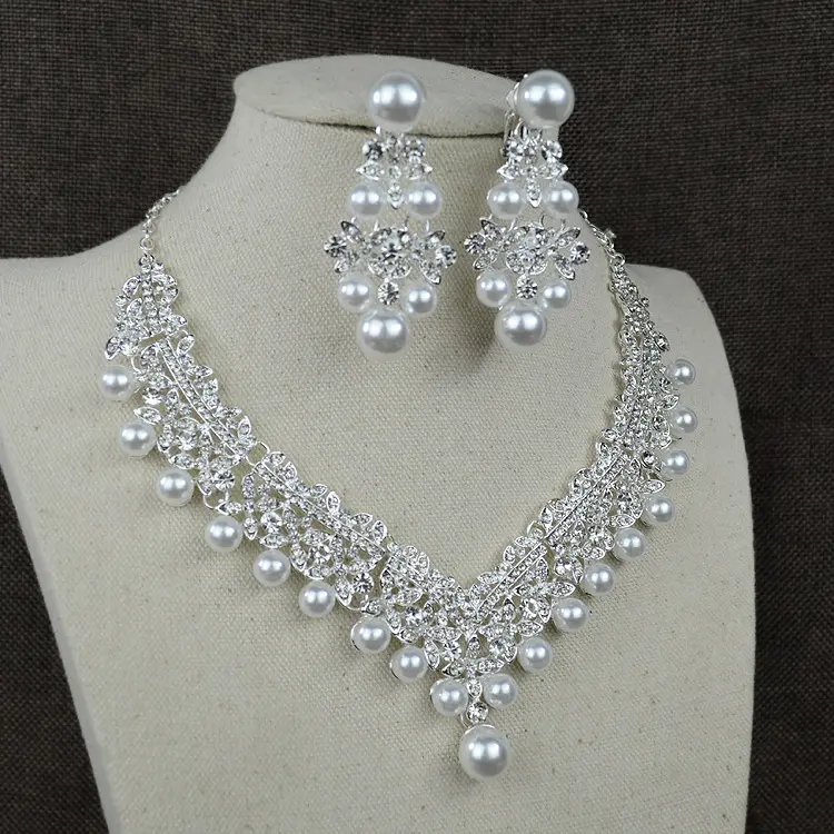 White pearl necklace diamond suit bride wedding