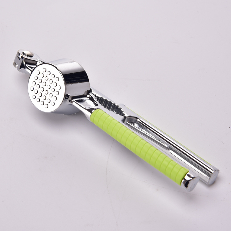 Stainless steel garlic squeezer