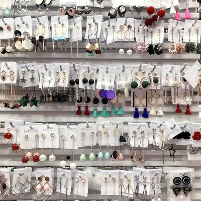 Korean bow tassel earrings asymmetric pearl flower