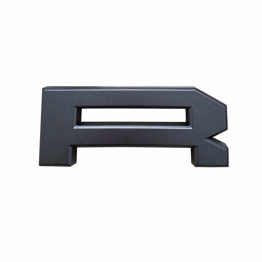 Underside detail of Ford F-150 Paramount grille letter insert mounting tabs