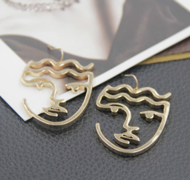 European and American retro simple abstract face pendant exaggerated atmosphere personality temperament long cold air earring earring girl