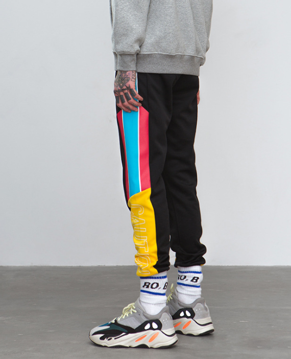 autumn new European and American multicolor contrast color men's elastic feet sports pants casual pants men's trousers