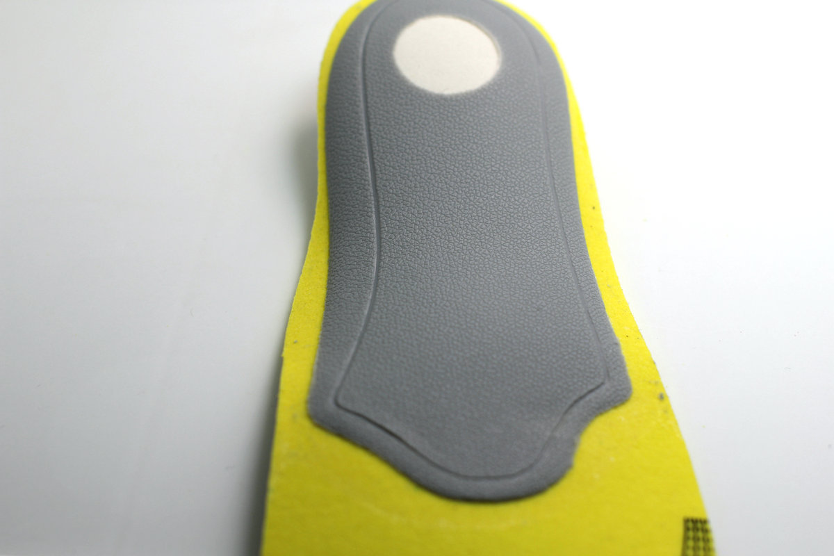 Arch orthodontic shock absorber insole