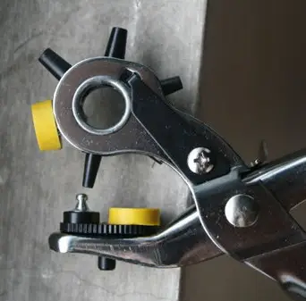 Multi-function puncher belt puncher hole eye clamp