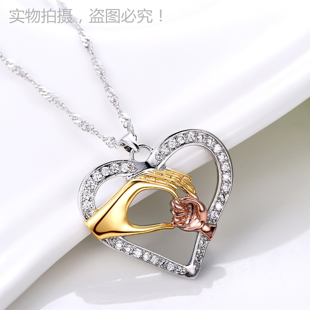 Big hand holding small hand necklace mother's hand heart-shaped necklace pendant