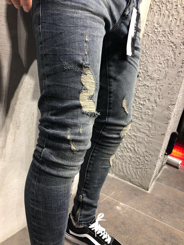 جينز رجالي بتصميم مخصص من أوروبا والولايات المتحدة، بنمط الحُفرة الشهير، بخصر ممتد، مقاسات كبيرة، بنطلون نحيف، وتصميم جينز الدراجة النارية