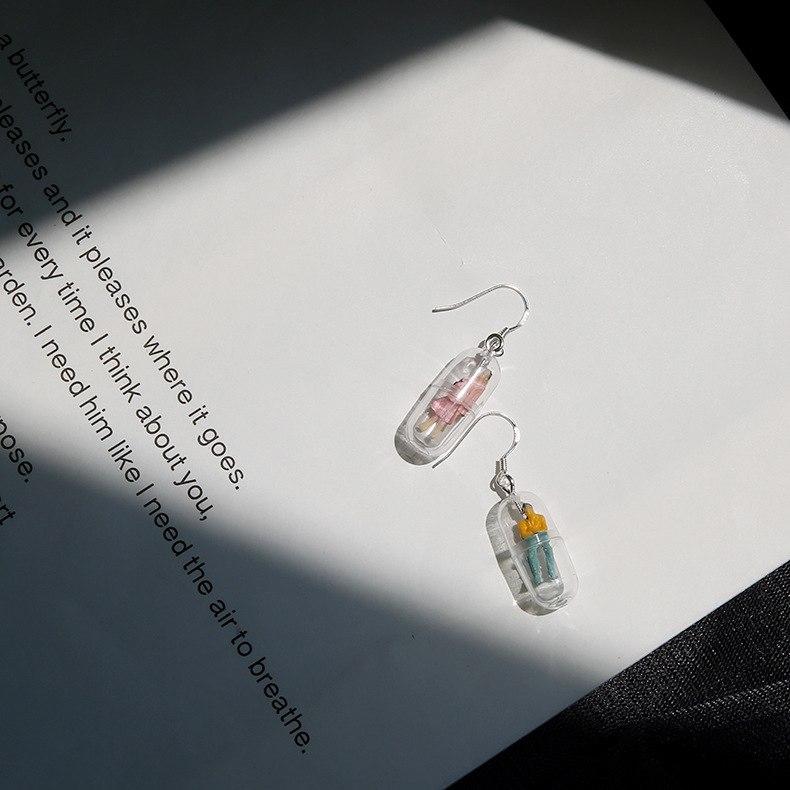 Human Capsule Earrings