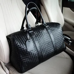 Spot spring new European and American style neutral travel bag business portable big bag solid colour single shoulder hand-woven bag - Black - View 1
