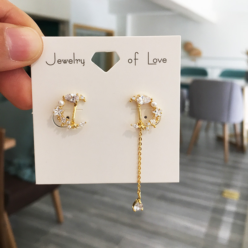 Asymmetrical moon earrings