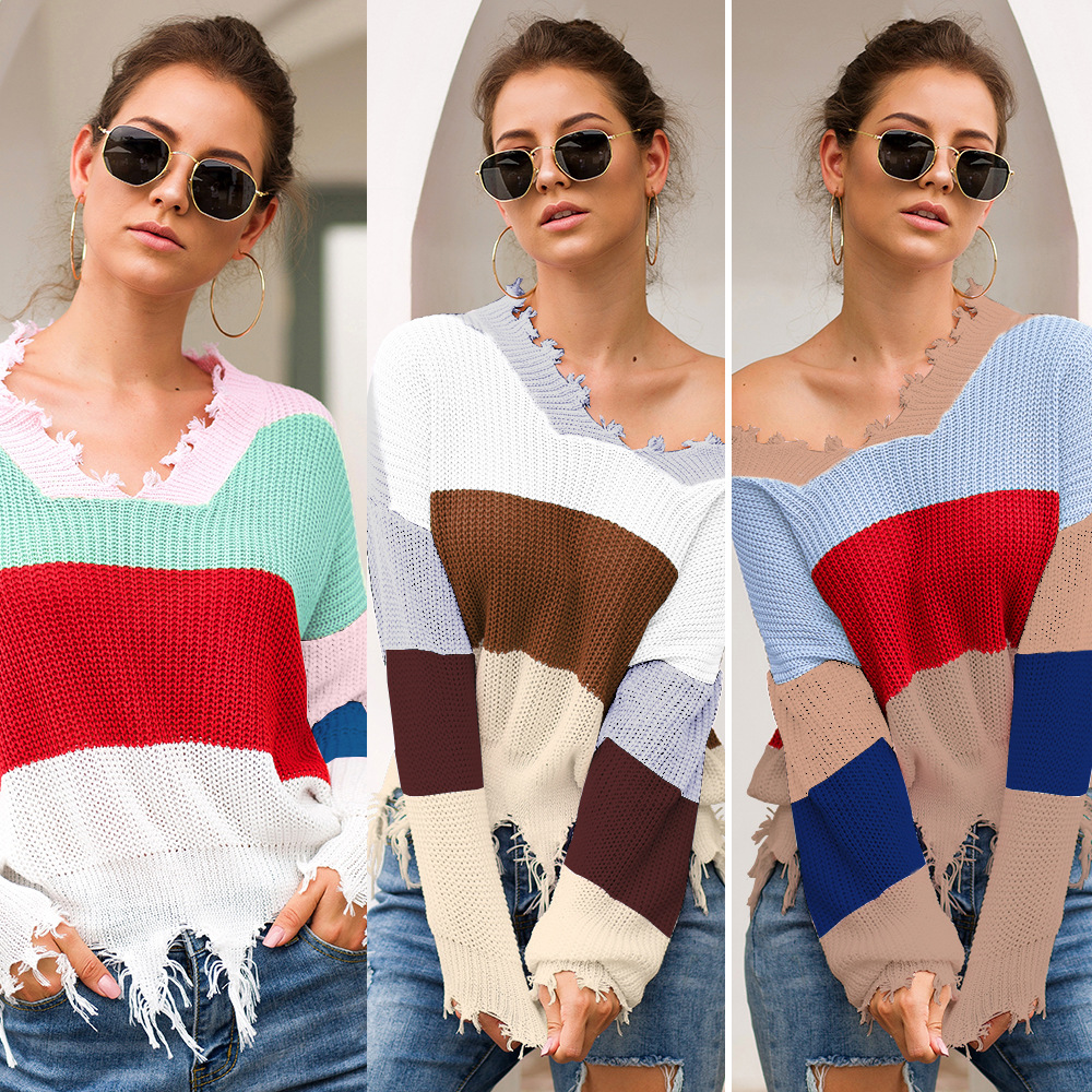 Wavy fringed hem loose knit sweater