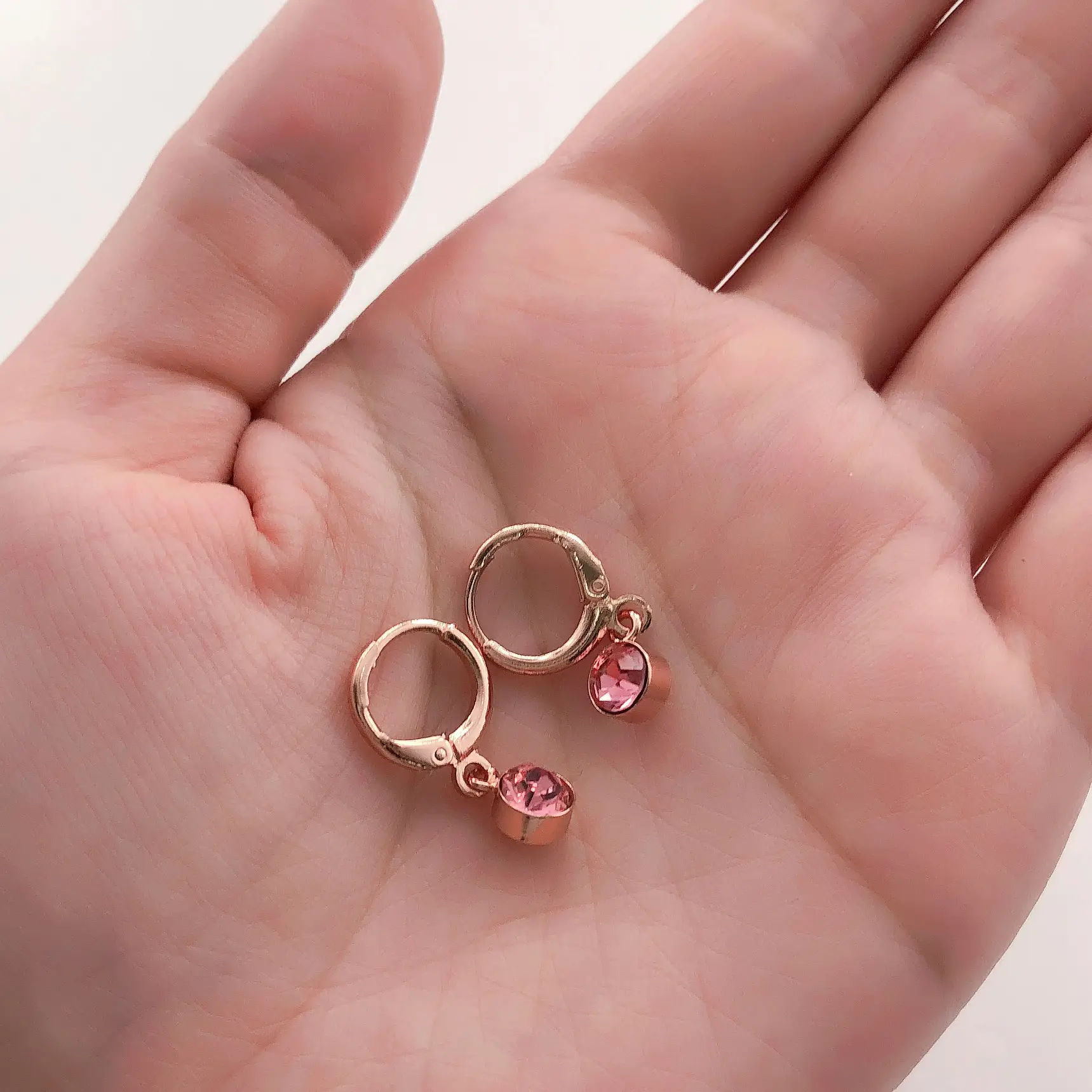 Copper and zircon rose gold earrings