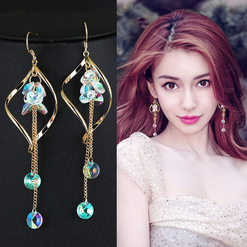 Wavy long crystal earrings