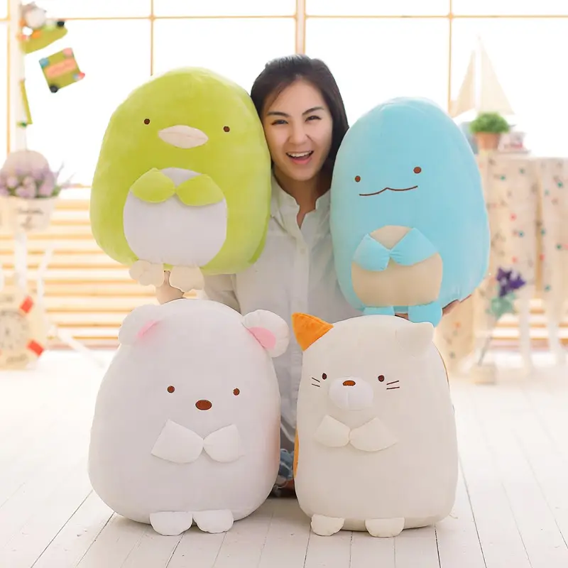 Corner creature doll holds cute plush toy