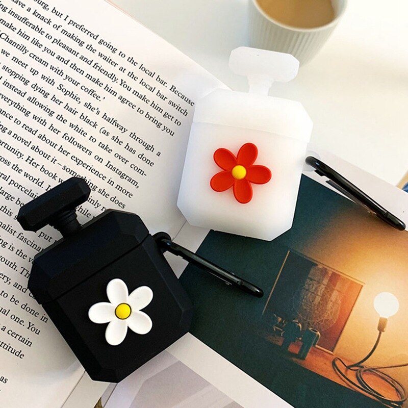 Funda de auriculares con botella de perfume floral