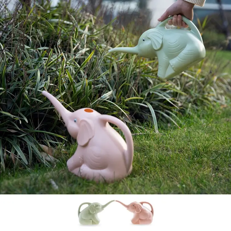 Baby Elephant Watering Flowers