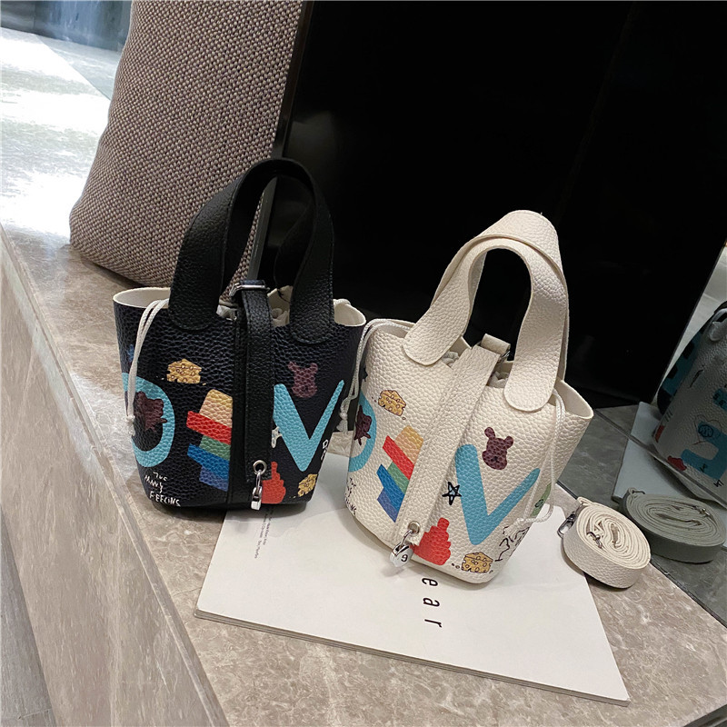 Female cartoon doodle diagonal bag