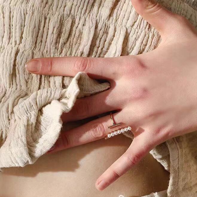 Simple pearl and diamond ring