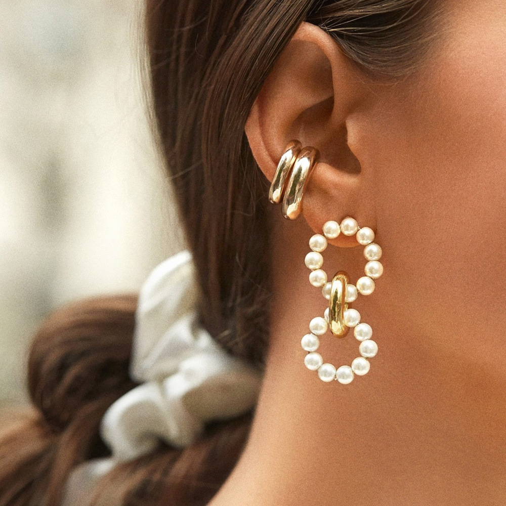 Pearl mosquito coil earrings