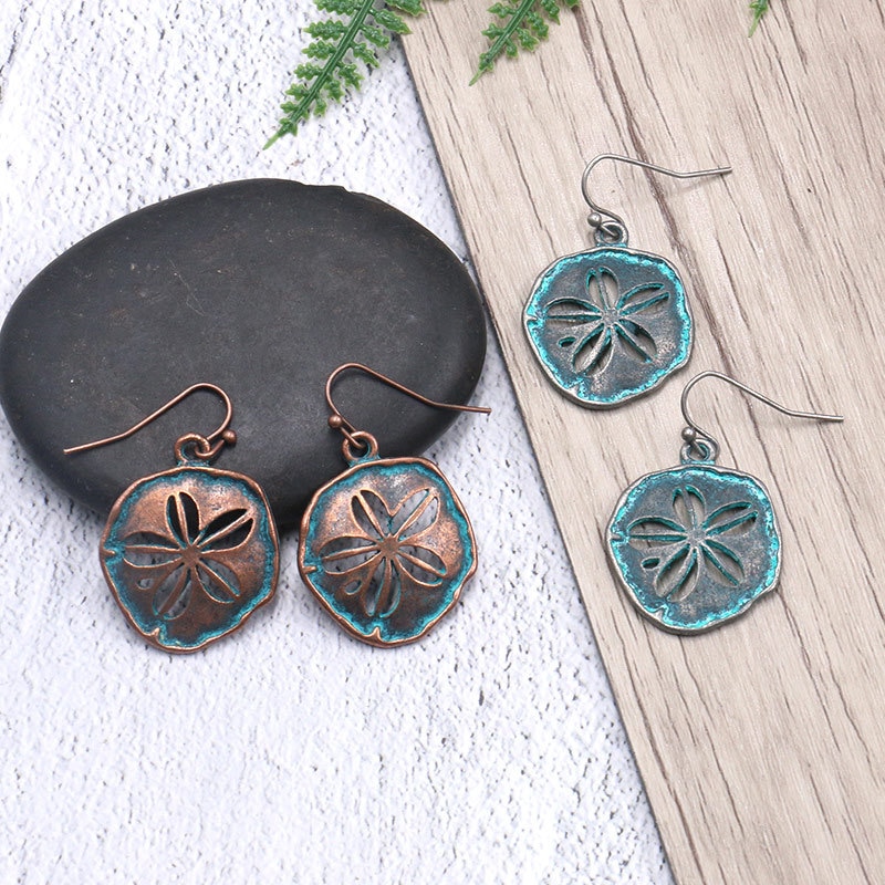 Distressed sunflower alloy earrings
