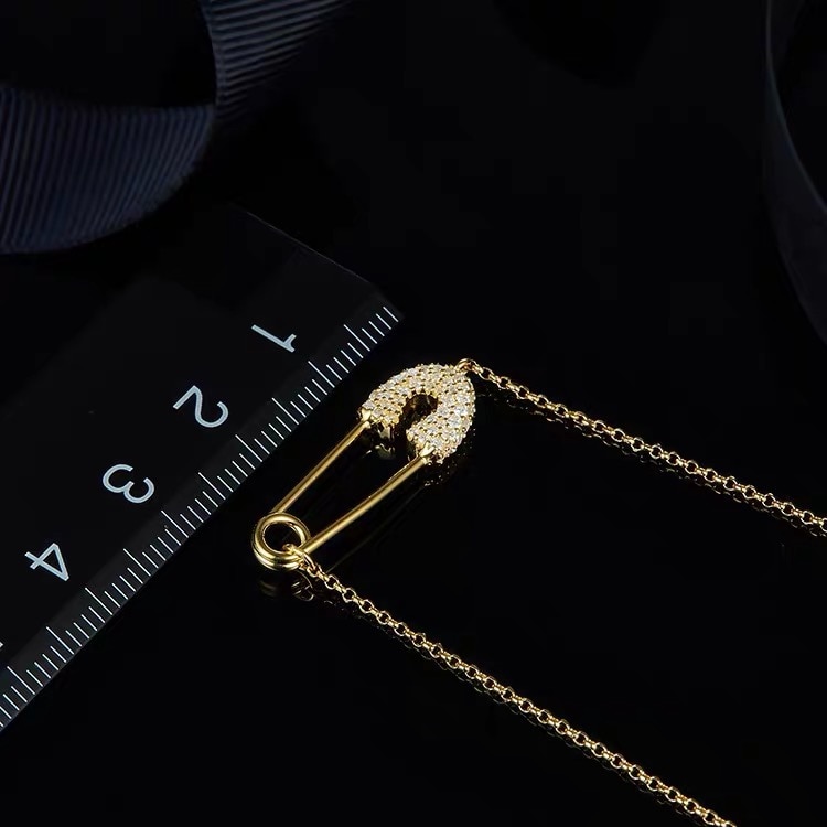 Paper clip sweater necklace with diamonds