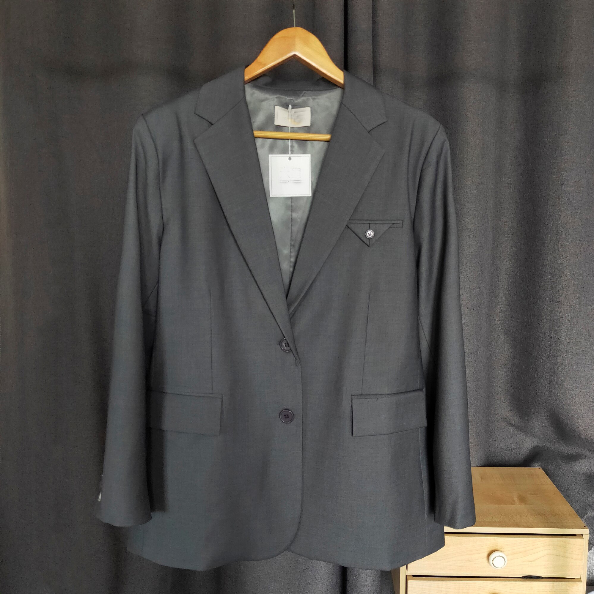 The latest triangle pocket loose suit women's thin coat