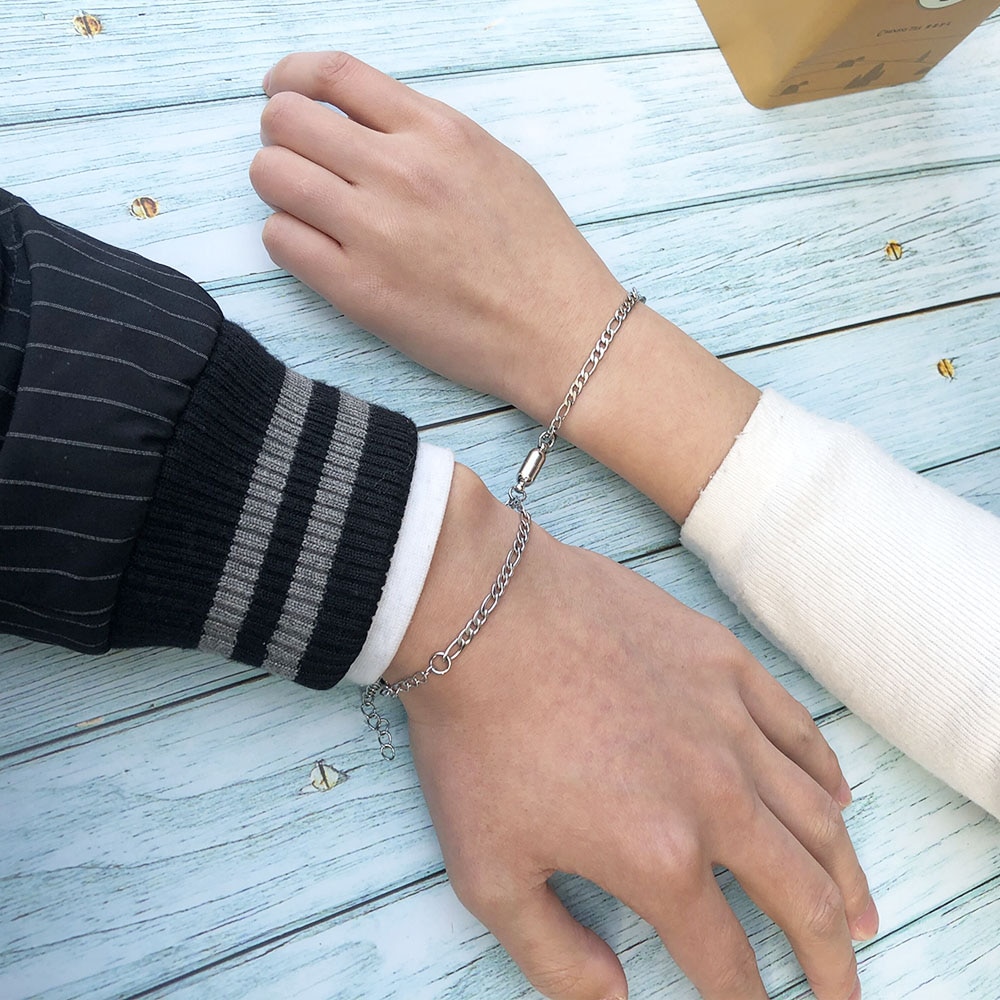 A Pair Of Stainless Steel Magnet Attract Couple Bracelet