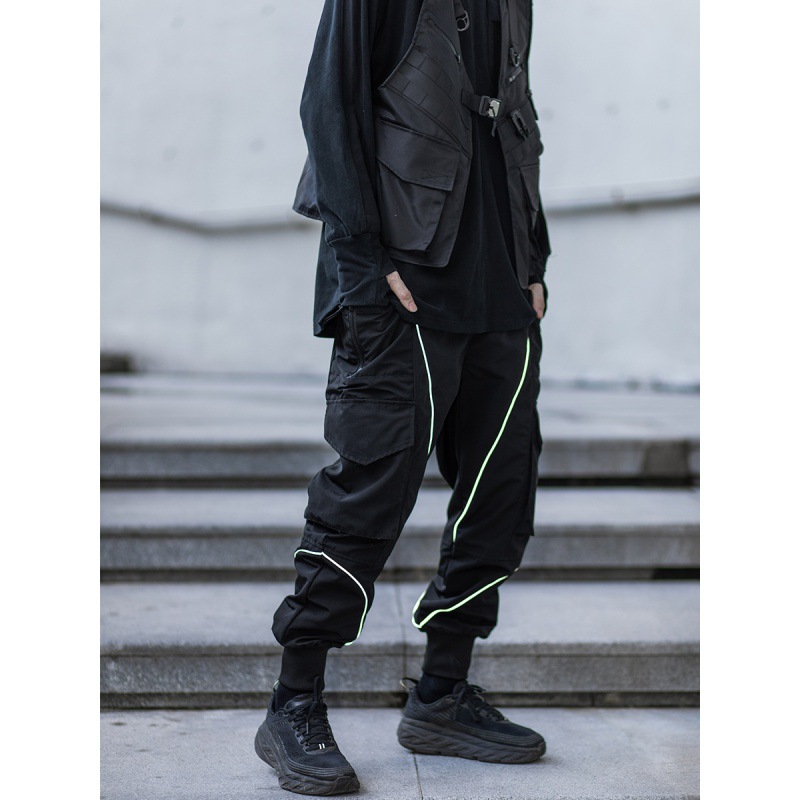 سروال كاجوال واسع بجيوب كبيرة وتصميم جديلة عاكسة مزدوجة